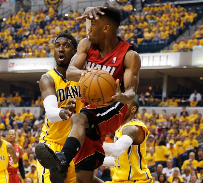Norris Cole si scontra con Roy Hibbert. Usa Today Sports